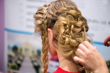 Elegant Blonde Braided Hairstyle Preparation In Beauty Salon Setting