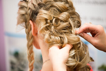 Close Up Of Professional Hairstyling Hands Creating Braided Texture