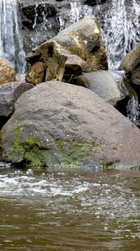 Rocky river scene with dynamic texture and motion. Ideal for Vertical commercial reels and travel marketing.
