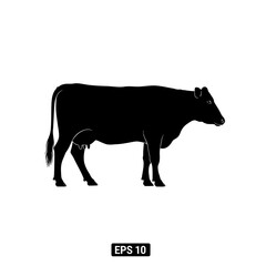 Obraz premium Black silhouette of a cow standing in profile.