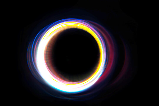 rainbow glowing ring on a black background