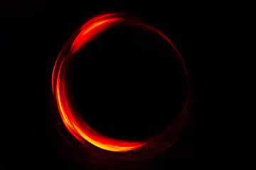 abstract red circle of light on a black background