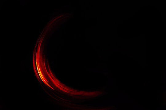 A red semicircle of light