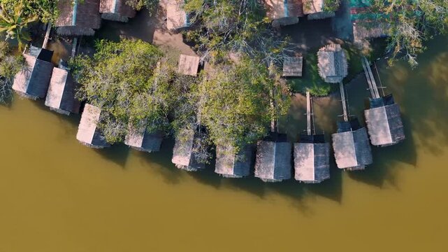 Top Down Traditional bamboo huts on Huay Tueng Thao Reservoir Chiang Mai Thailand