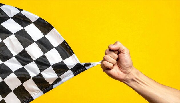 Hand Gripping a Checkered Racing Flag Against a Bright Yellow Background