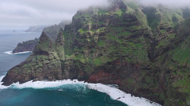 Aerial view over the rugged Anaga Massif peaks and the prehistoric barrancos of Punta del Hidalgo, Tenerife