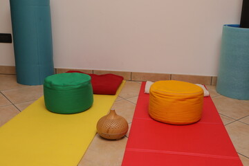 Yoga mats and meditation cushions prepared for wellness and mindfulness