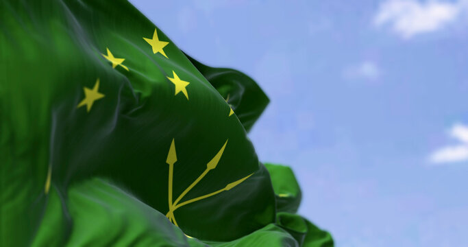 The Circassian flag waving in the wind on a clear day