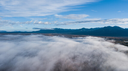 Clouds over landscape with mountains, Aerial View, Nature Landscapes, Taos New Mexico USA