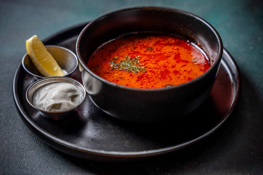 Traditional Solyanka Soup With Lemon And Sour Cream