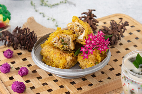 Indonesian tahu isi fritters, tofu stuffed with vegetables, popular street food snack.