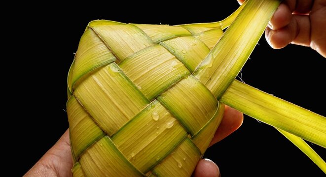 Close-up of Traditional Indonesian Ketupat Weaving from Young Coconut Leaves