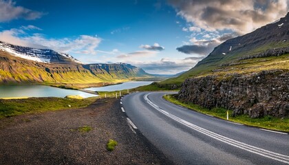 a winding mountain road through the westfjords region of iceland between dyrafjordur and arnarfjordur