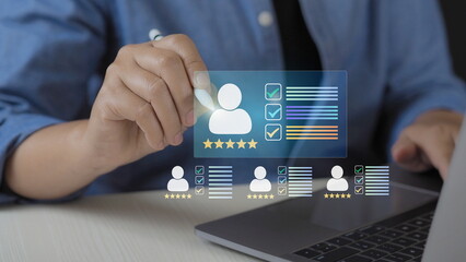 Business professional giving five star customer review on laptop with virtual feedback interface, online rating system, user experience evaluation, satisfaction survey 