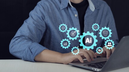 Business professional using laptop with AI interface icons and digital gears, artificial intelligence automation, data analytics, cloud computing, and smart technology innovation concept.