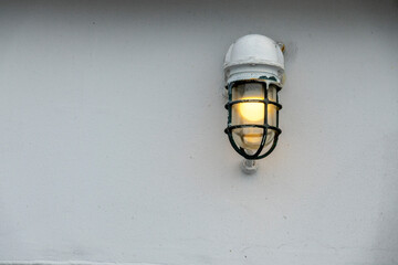 A light on a big ship wall
