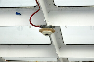 A smoke detector on a big ship