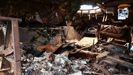 Rusty and burned-out armored vehicles on ukrainian territory. Exhibition of destroyed military equipment of the russian army. War between Ukraine and russia. Close up Slow motion