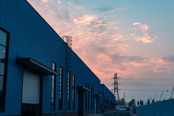 Beautiful exterior view of the Machinery & Iron Factory at sunset