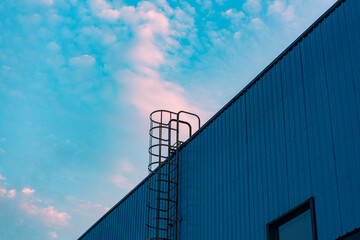 Beautiful exterior view of the Machinery & Iron Factory at sunset