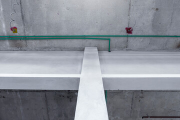 Public utilities within the construction of large buildings, such as electrical systems, fire hydrants in ceiling frames.   © noppadon