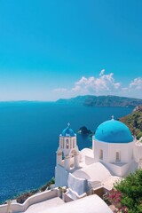 Obraz premium Stunning azure sea contrasts with white architecture under vibrant blue sky