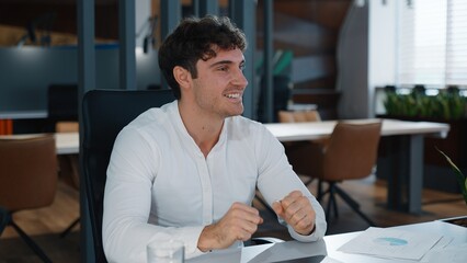 Caucasian positive business man smiling happy cheerful professional with closed laptop good work...