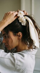 Using Silk Scrunchie for Gentle Hair Tie and Damage Prevention