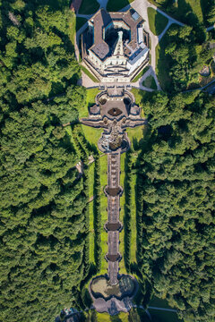 Aerial view of a striking symmetrical arrangement with Herkules statue, the grand cascade, the grotto of Neptune and the lush greenery of Bergpark Wilhelmshohe, Kassel, Hessen, Germany.