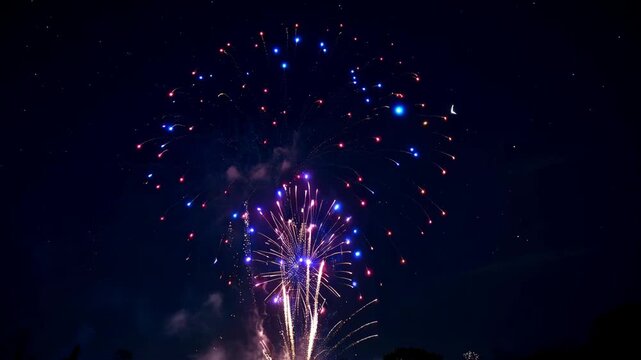 Colorful fireworks display against a starry night sky celebrating national holidays with festivities and a vibrant atmospheric effect