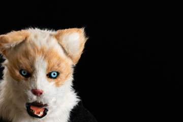 Animal Fursuit Mask on Black Background with Copy Space, Side-Framed Therian Mask with Blue Eyes and Open Mouth