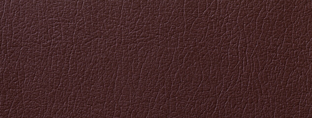 Dark brown leather texture background with fine grain, macro surface. Upholstery structure fabric backdrop