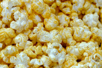 Heap of yellow seasoned popcorn