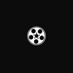 Abstract illustration of a film reel symbol on a dark background for design