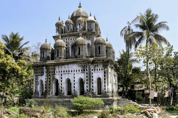 Obraz premium 'narajole hawamahal', ruined two-story colonial mansion with corner towers, a central balcony, and a grand semi-circular porch supported by tall corinthian columns