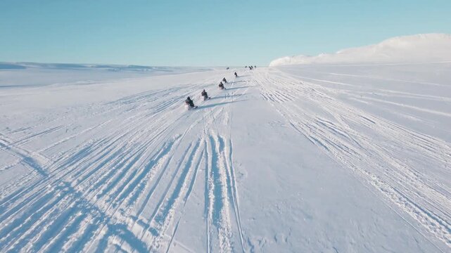People on snowmobiles on langj&ouml;kull glacier in iceland