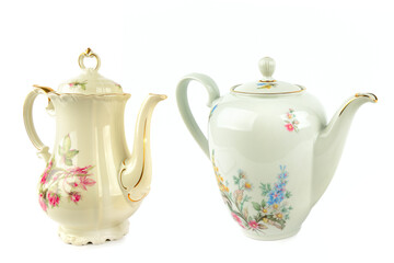Two Antique Ceramic Coffee Pots with Elegant Flower Design