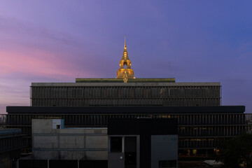 The Sappaya-Sapasathan, Thailand's iconic Parliament House, gracefully overlooks the Chao Phraya River, a harmonious blend of modern architecture and cultural heritage.