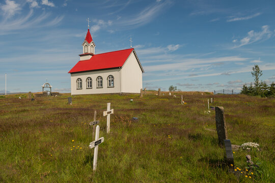 Hofskirkja turf church in a peaceful icelandic landscape