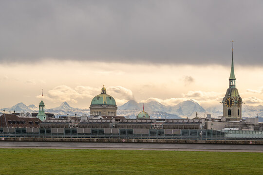 Skyline of Bern, Switzerland and Swiss Alps on Cloudy Day. View from Grosse Schanze 