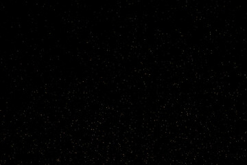 Obraz premium Abstract image of twinkling stars against a deep black background perfect for space or fantasy themes