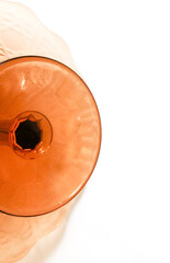 Orange vase on a white background.