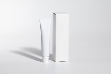 Mockup of a white box and tube of cream or ointment