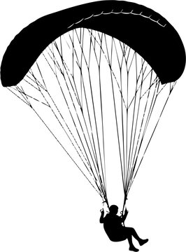 silhouette of a person paragliding