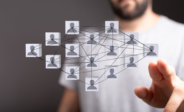 Concept of digital networking and community shown via an abstract network of connected people. Concept of teamwork, coll