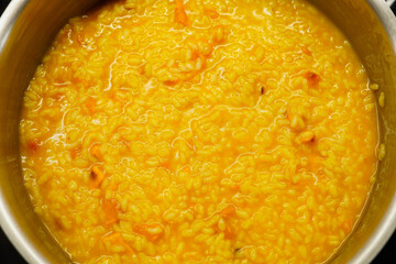 pot of pumpkin risotto made with kabocha squash, shot directly from above