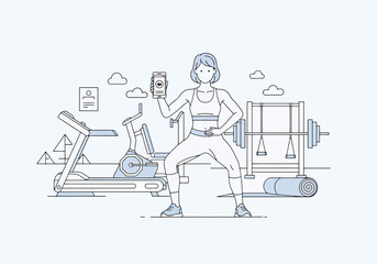 Woman holding nutrition supplement bottle in modern gym interior with cardio equipment and weightlifting rack for fitness lifestyle