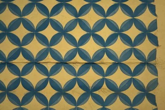 Vintage envelope lining, geometric blue pattern on yellowed paper, security tint