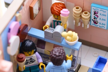 Fototapeta premium Tambov, Russian Federation - January 19, 2026 Lego small Italian gelateria with seller and buyers inside. Close-up