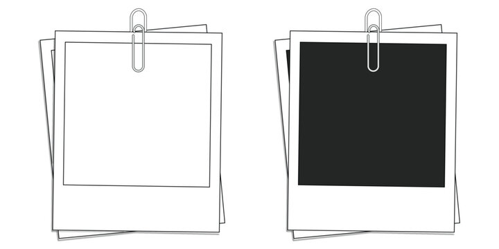 Two blank polaroid photos hanging on a line by a clip, side by side, one black and one white